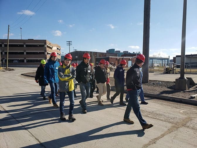 Students walk the grounds of the Detroit Wastewater Treatment Plant